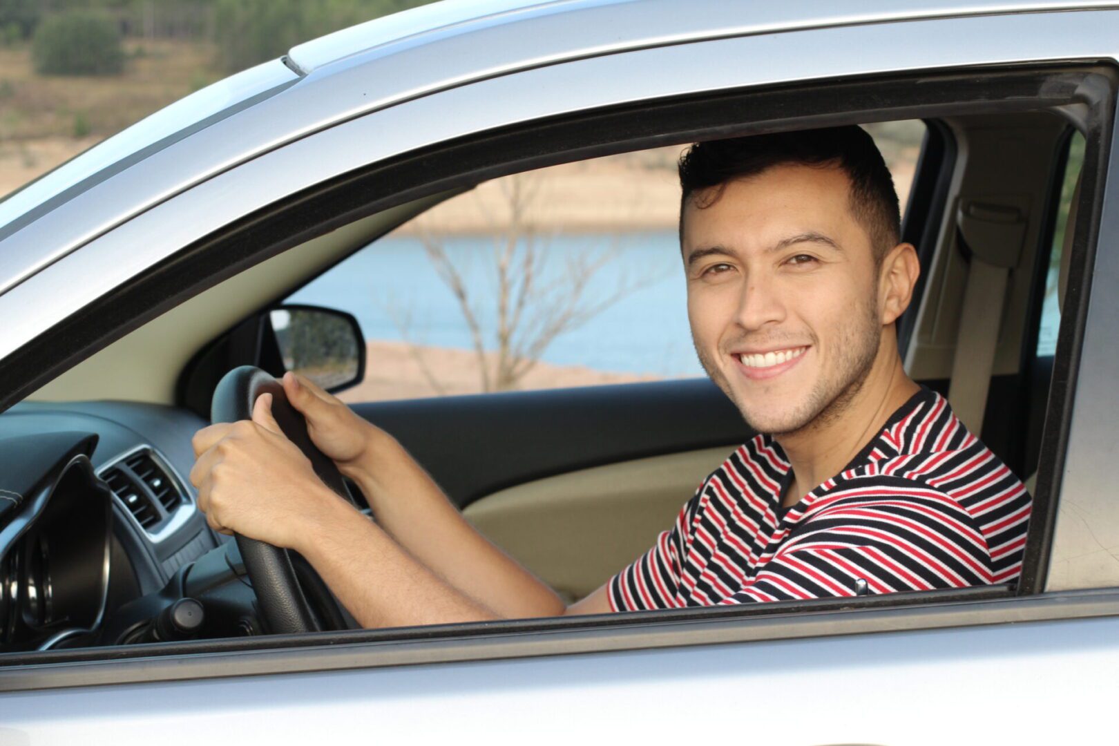 Satisfied customer with a new car.