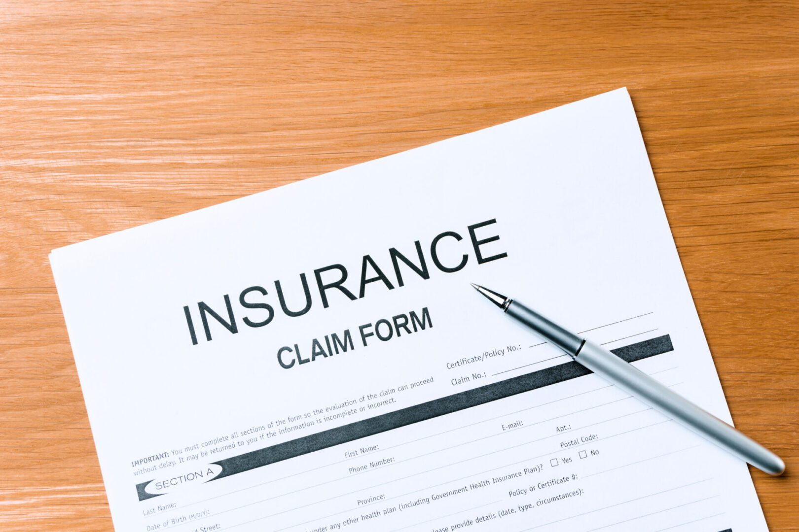 Insurance claim form on table
